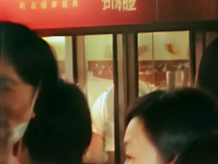 Recraft Creative: a 56 × 42 px detail of the night market photo