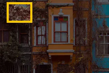 Where the detail is in the whole photo: Houses, Istanbul: a 100 × 75 px detail of the 504 × 336 px input.