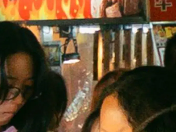 Original photo: a 56 × 42 px detail of the night market photo