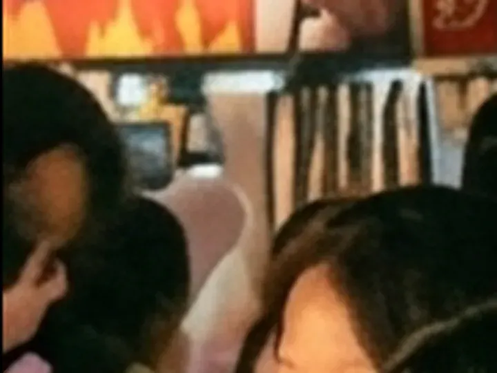 Gemini: a 56 × 42 px detail of the night market photo