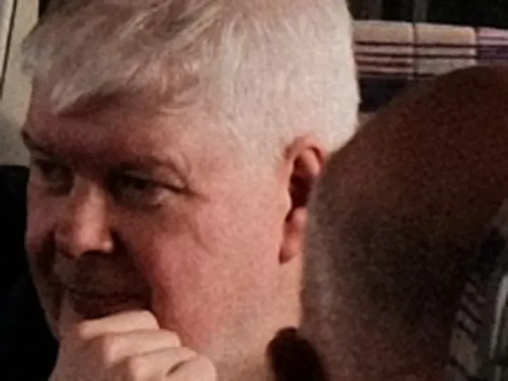 Original photo: a grey-haired passenger