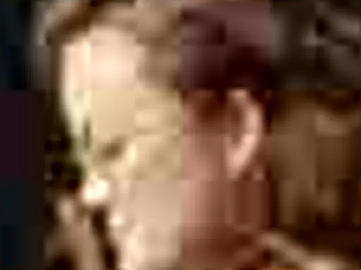What every tool got: a musician with thin wire glasses, heavy JPEG