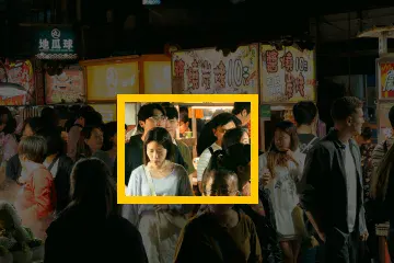 Where the detail is in the whole photo: Night market: a 160 × 120 px detail of the 504 × 336 px input.