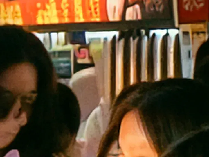 MegaPotato: a 56 × 42 px detail of the night market photo