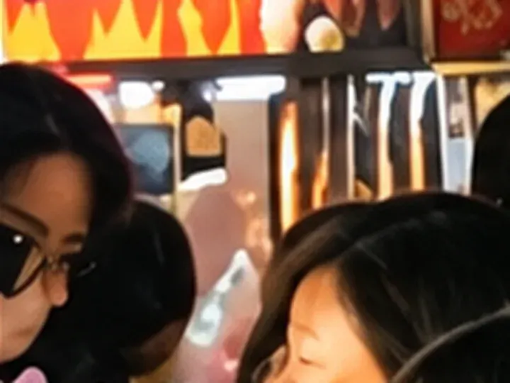 ChatGPT: a 56 × 42 px detail of the night market photo