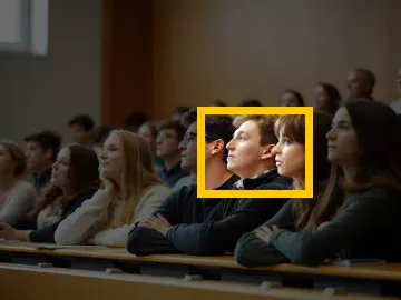 Where the detail is in the whole photo: AI image of a lecture hall: a 96 × 72 px detail of the 384 × 288 px input.